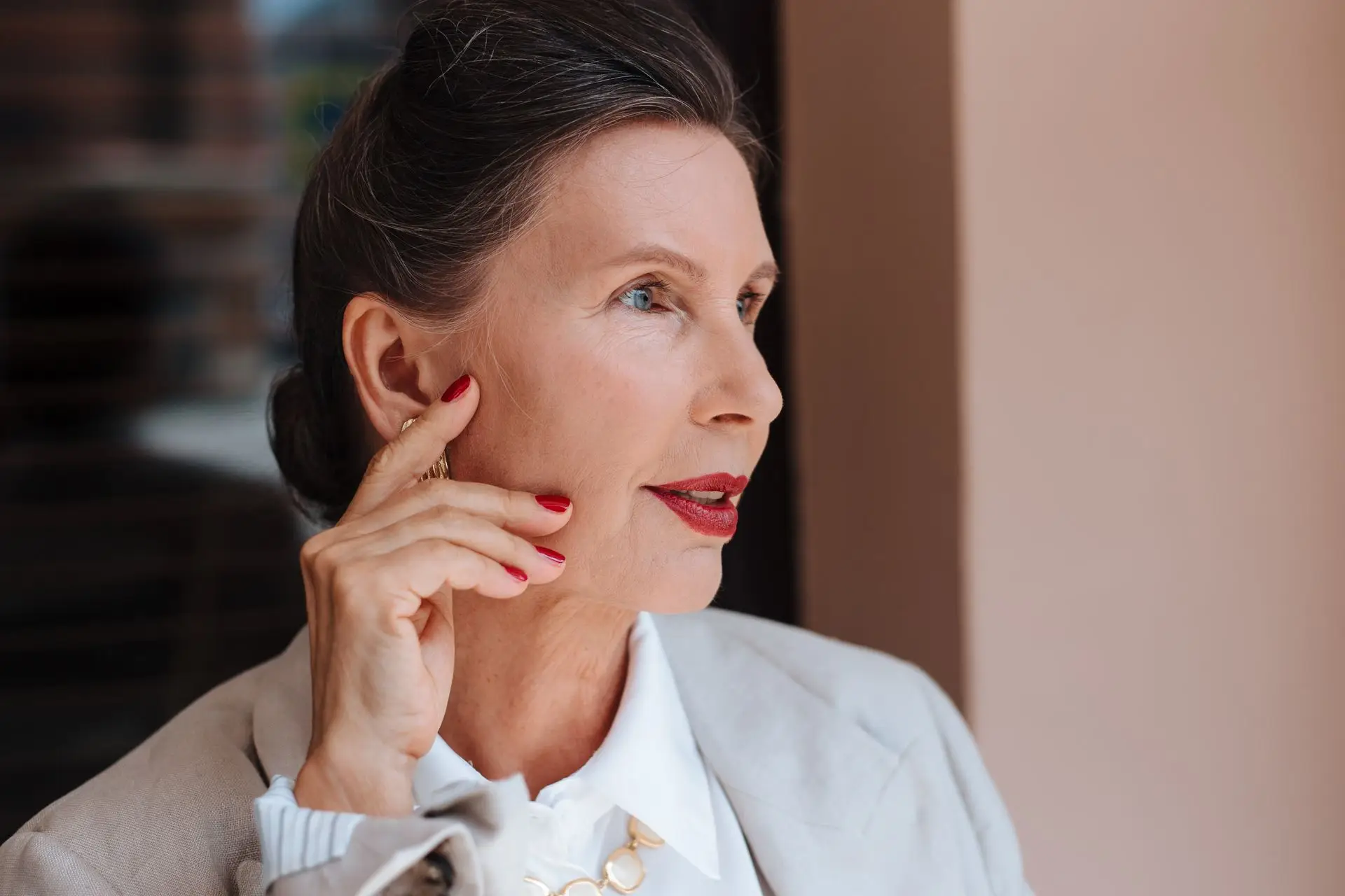 Older adult discussing hearing care with a professional